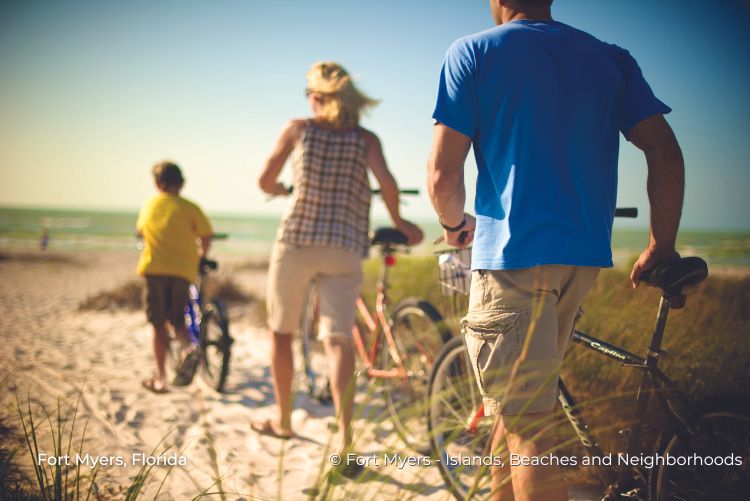 Couple beach family bikes Fort Myers, Florida 25Aug22