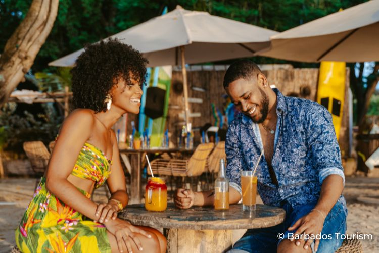 14. Couple drinking cocktails beach bar, Barbados 02Sep22