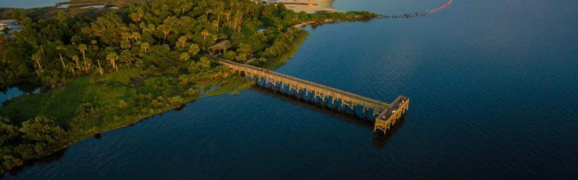 Fort Island Trail Pier and beach Discover Crystal River Campaign scrolling banner 28Dec22