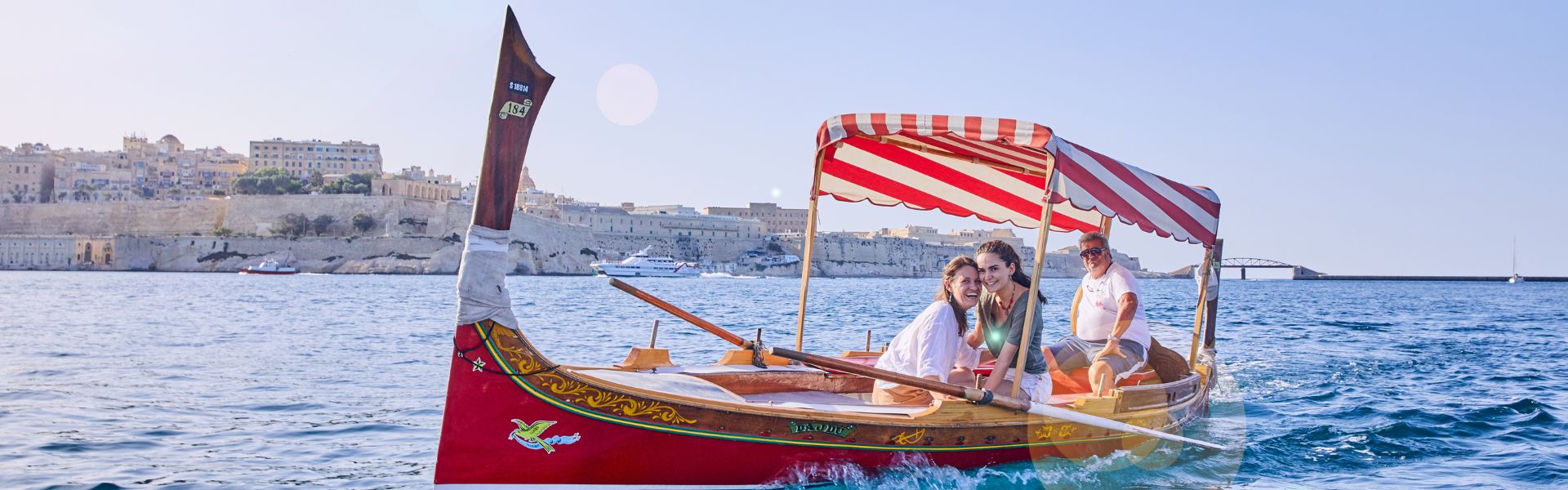 Malta Campaign page banner couple boat 02May23 (2)